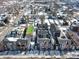Aerial view of a residential neighborhood with modern townhomes and single-Gathering houses at 2115 Coretta Way, Indianapolis, IN 46202