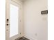 Bright entryway featuring a frosted glass door, modern lock, and light-colored walls at 2115 Coretta Way, Indianapolis, IN 46202