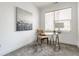 Bright home office featuring natural light, modern desk, and neutral carpet at 2115 Coretta Way, Indianapolis, IN 46202