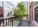 Private balcony with black railings offering views of the surrounding neighborhood at 2139 Coretta Way, Indianapolis, IN 46202