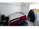 Cozy bedroom with neutral walls, dark flooring, and lots of natural light at 321 N Elder N Ave, Indianapolis, IN 46222