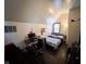Bedroom featuring a bed and a desk, perfect for a workspace or guest room at 321 N Elder N Ave, Indianapolis, IN 46222