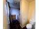 Functional laundry area with a toilet for added convenience at 321 N Elder N Ave, Indianapolis, IN 46222