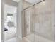 Modern bathroom featuring a glass-enclosed shower with tile surround and neutral tones at 4406 Mendocino Blvd, Indianapolis, IN 46075