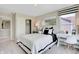 Bright bedroom featuring a desk, a closet, and modern decor at 4406 Mendocino Blvd, Indianapolis, IN 46075