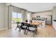 Eat-in kitchen area featuring stainless steel appliances and island seating at 4406 Mendocino Blvd, Indianapolis, IN 46075