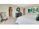 Stylish bedroom with a king bed, dresser, and bright sunny windows at 4406 Mendocino Blvd, Indianapolis, IN 46075