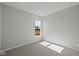 Bedroom with neutral carpet and a bright window with a view to outside at 5040 Carmine St, Brownsburg, IN 46112