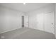Bedroom featuring neutral carpet, a closet with sliding doors, and an adjoining bathroom at 5040 Carmine St, Brownsburg, IN 46112