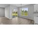 The dining area includes sliding glass doors leading to the outside and a view of the backyard at 5040 Carmine St, Brownsburg, IN 46112