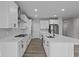 Bright and spacious kitchen equipped with stainless steel appliances and center island at 5040 Carmine St, Brownsburg, IN 46112