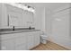 Bright bathroom with double sink vanity, tub-shower, and modern fixtures at 5119 Rolling Meadow Blvd, Indianapolis, IN 46237