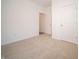 Carpeted bedroom featuring two closets and a door at 5146 Cartland Dr, Indianapolis, IN 46239