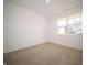 Bright and spacious bedroom featuring neutral carpet and a large window with natural light at 5146 Cartland Dr, Indianapolis, IN 46239