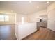 Bright kitchen showcasing stainless steel appliances, a large island with seating, and an open floor plan at 5146 Cartland Dr, Indianapolis, IN 46239
