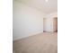 Empty bedroom showing carpeting, neutral walls, and multiple doorways at 5146 Cartland Dr, Indianapolis, IN 46239
