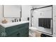Modern bathroom featuring a green vanity and a glass-enclosed shower at 6842 Cardinal Dr, McCordsville, IN 46055