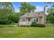 Charming home featuring a well-manicured lawn, neutral siding, and inviting front porch at 6865 Meadow View Dr, Lawrence, IN 46226