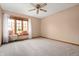 Empty bedroom with neutral carpet, window seat, and natural light at 7018 W Anton Way, New Palestine, IN 46163