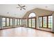 Beautiful sunroom featuring vaulted ceilings, tile floors, and an abundance of natural light at 7018 W Anton Way, New Palestine, IN 46163