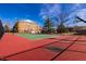 Outdoor tennis and basketball court within a residential community at 8690 Jaffa Ct W Dr # 18, Indianapolis, IN 46260