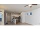 Open floor plan of the living room with bright lighting adjacent to the modern kitchen at 9208 Hawley Dr, Indianapolis, IN 46216