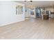 Bright living room shows an open floor plan into the dining room and kitchen at 9208 Hawley Dr, Indianapolis, IN 46216