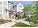 Charming townhomes featuring inviting front porches and meticulously landscaped surroundings, creating a welcoming ambiance at 9208 Hawley Dr, Indianapolis, IN 46216