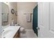 Clean bathroom featuring a tub shower and built-in storage at 11 Stratford Way, Danville, IN 46122