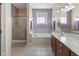 Bright bathroom with a soaking tub, walk-in shower, and double sink vanity at 11 Stratford Way, Danville, IN 46122