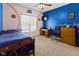 Fun bedroom featuring baseball decor and lots of natural light at 11 Stratford Way, Danville, IN 46122