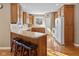 Charming eat-in kitchen with wood cabinets, a breakfast bar, and stainless steel appliances at 11 Stratford Way, Danville, IN 46122