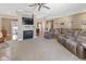 Spacious living room with fireplace, comfortable seating, and an open layout to the dining area at 11 Stratford Way, Danville, IN 46122