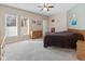 Primary bedroom featuring two large windows and neutral colors at 11 Stratford Way, Danville, IN 46122