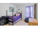Bedroom featuring carpet floors, butterfly curtains, a single bed and a black bean bag chair at 11130 Sanabria Dr, Indianapolis, IN 46235