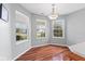 Cozy breakfast nook with hardwood floors and bright natural light at 11130 Sanabria Dr, Indianapolis, IN 46235