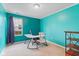 Vibrant office space with carpeted floors, desk with rolling chair, a window and wood shelving unit at 11130 Sanabria Dr, Indianapolis, IN 46235