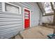 Side view of a home showing back entry door, siding and concrete stoop at 1421 Shepard St, Indianapolis, IN 46221
