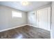 Cozy bedroom featuring updated flooring, fresh paint, and natural light at 1421 Shepard St, Indianapolis, IN 46221