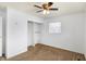 Bright bedroom features neutral carpet and an open closet at 143 Sawmill Rd, Whiteland, IN 46184