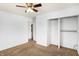 Bright bedroom features neutral carpet and an open closet, plus a view to another room at 143 Sawmill Rd, Whiteland, IN 46184