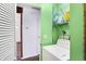 Utility Room with washer, and wall storage shelving for added convenience and organization at 143 Sawmill Rd, Whiteland, IN 46184