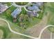 Aerial shot of an outlined lot surrounded by manicured lawns, mature trees, and a golf course, offering a serene setting at 16473 Valhalla Dr, Noblesville, IN 46060
