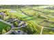 Expansive aerial view of a lot with lush greenery, nestled in a neighborhood near a golf course and serene lakes at 16473 Valhalla Dr, Noblesville, IN 46060