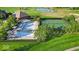 Aerial view of the community pool and tennis court with beautiful landscaping at 16473 Valhalla Dr, Noblesville, IN 46060