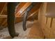 Attic with insulation and ductwork shows a space ready for finishing or efficient storage at 1655 Rosebud Ln, Greenwood, IN 46143