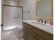 Elegant bathroom features a marble-tiled shower, modern vanity, and stylish bronze fixtures at 1655 Rosebud Ln, Greenwood, IN 46143