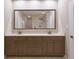 Elegant bathroom featuring double sinks, spacious countertop, and large decorative mirror at 1655 Rosebud Ln, Greenwood, IN 46143