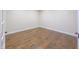 Bedroom with hardwood flooring, base trim, and natural light at 1655 Rosebud Ln, Greenwood, IN 46143