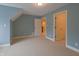 Bright bedroom with carpet and natural light includes an alcove and easy access to other rooms at 1655 Rosebud Ln, Greenwood, IN 46143